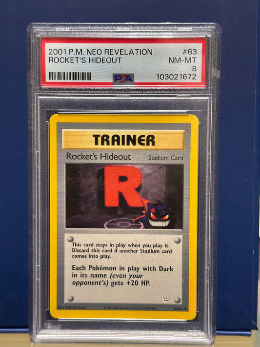 Rocket's Hideout #63 Pokemon Neo Revelation PSA 8